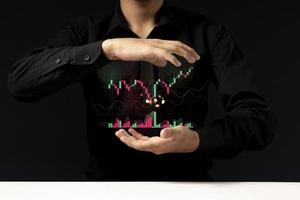 young investor or business man with graphic global network connection and graph chart of stock market investment trading photo