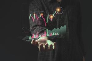 young investor or business man with graphic global network connection and graph chart of stock market investment trading photo