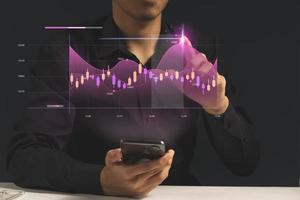 young investor or business man with graphic global network connection and graph chart of stock market investment trading photo