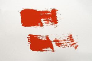 Red brush stroke abstract art on paper art background photo