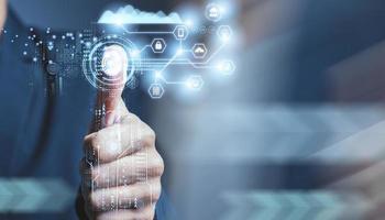 businessman scan fingerprint biometric identity. concept of the future of security and password control photo