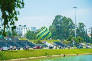 A view of Lam Vien square at the bank of Xuan Huong Lake. In Vietnam, Da Lat is a popular destination attracting thousands of tourists. photo