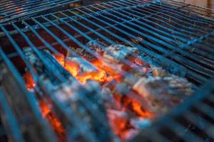 Close up Grilled girdle cake Banh Trang Nuong , a famous Vietnamese street stall eatery, a popular Vietnamese food in Da lat at night photo