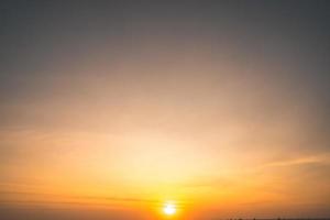 Scenic orange sunset sky background. digital lens flare. Background cloud summer. Cloud summer. Sky cloud clear. Natural sky beautiful yellow and white texture background. Cinematic photo