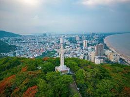 Top view of Vung Tau with statue of Jesus Christ on Mountain . the most popular local place. Christ the King, a statue of Jesus. Travel concept. photo