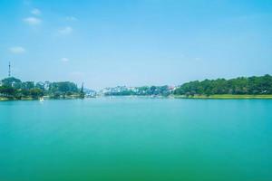 Fabulous sunrise by Xuan Huong Lake, in center Da Lat City, Lam Dong Province, Vietnam. This artificial lake in the city centre is a favourite place for tourists and locals for walking. photo