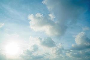 Background cloud summer. Cloud summer. Sky cloud clear. Natural sky beautiful blue and white texture background with sun rays shine photo