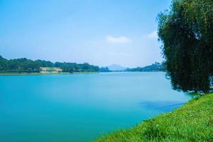 Fabulous sunrise by Xuan Huong Lake, in center Da Lat City, Lam Dong Province, Vietnam. This artificial lake in the city centre is a favourite place for tourists and locals for walking. photo