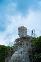 Buddhist Temple in Vietnam , Mot Hon  Linh Quang Monastery. Beauty architecture leads to Lord Buddha statue, which attracts tourists to visit spiritually on weekends photo