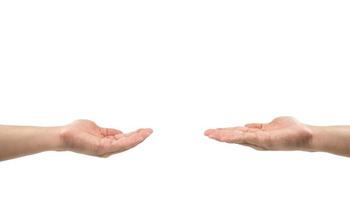 Two Asian men open hand together to share somethings empty on their hands on white background. Clipping path photo