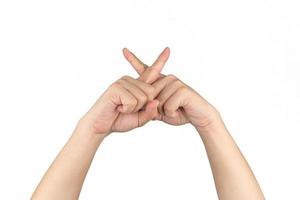 Asian Thai males raises up his arms hands hand finger and isolated post cross together on the white background. photo