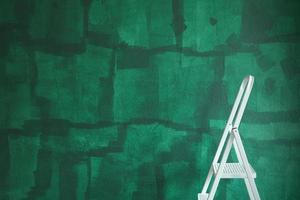 White step ladder in front of green work in progress wall. Home repair concept, interior painting landscape shot. photo