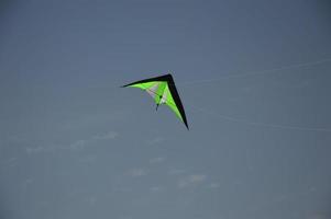 A steering kite in the blue sky photo