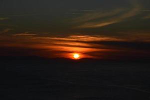 Cloudy sky during the sunset photo