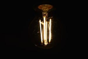 Light bulb with black background photo