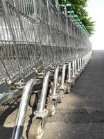 Closeup shopping carts in a row photo