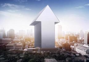 Arrows on skyscrapers background. Ambition and challenge concept photo
