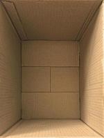 Empty open rectangular cardboard box close up photo