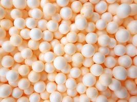Background of white circle styrofoam ball pattern texture foam surface abstract background photo