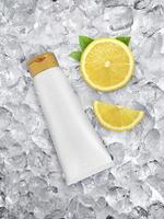 Plastic cosmetic tube for cream, on ice background and pieces of juicy lime photo