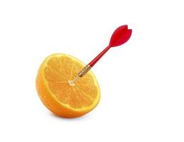 Orange fruit with circular target marked and red dart on white background. minimal idea food and fruit concept. An idea creative to produce work within an advertising marketing communications photo