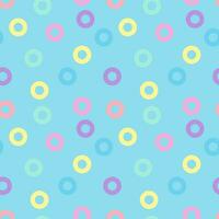 Pastel color small donut circle pattern seamless background on blue background. vector