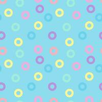 Pastel color small donut circle pattern seamless background on blue background. vector