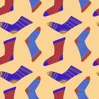 Seamless pattern of cozy knitted socks. Vector background for wrapping paper and different textile design.