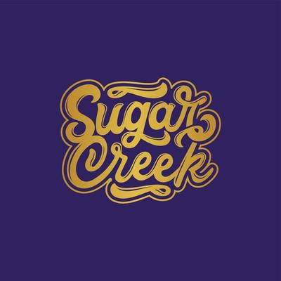 sugar creek writing logo in cursive font style with gold color