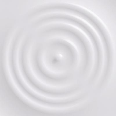 Drop falling on milk surface