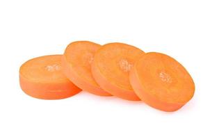 Carrot slices isolated on white background. Top view photo