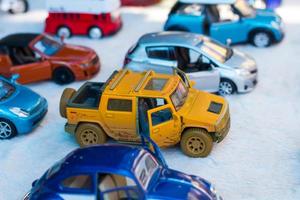 Toy cars are yellow. photo