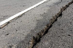 Wet asphalt cracks photo
