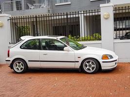 Cape Town Western Cape South Africa 2018 Small white car in Newlands, Cape Town, South Africa. photo