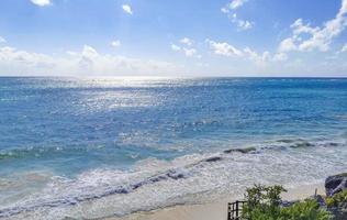 Ancient Tulum ruins Mayan site temple pyramids artifacts seascape Mexico. photo