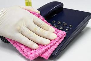 Concept Prevention cleaning frequently, Focus on the high traffic areas that enable pathogens to spread around the telephone equipment such Phone button photo