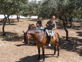 RONDA, ANDALUCIA, SPAIN, 2014. Horse riders at a farm near Ronda Spain on May 8, 2014. Unidentified men. photo