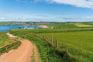 View along the South West Coastal Path towards Thurlestone in Devon photo