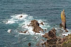 Wild rocky coast near Thurlestone in Devon photo