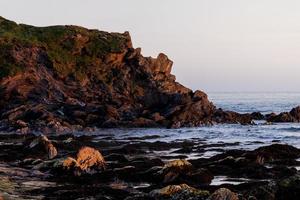 Sunset at Outer Hope by South Milton Sands in Devon photo