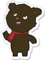 sticker of a cartoon black bear wearing scarf vector