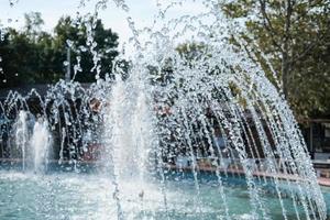 fountain in the street of a small town. photo