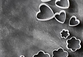 cookie cutters on grey background. photo
