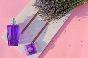 lavender flower perfume on a wooden tray photo