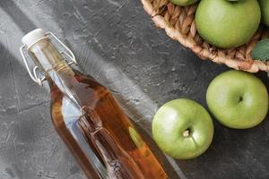 Apple vinegar. Bottle of Homemade apple organic vinegar photo