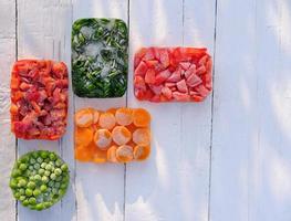 Frozen vegetables in geometric shapes. top view. photo