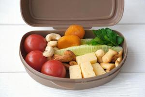 Back to school concept. Healthy lunch box photo