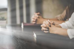 Two women praying worship believe photo