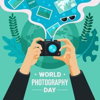 manos tomando una foto con cámara en el día mundial de la fotografía vector