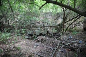 Car in Chernobyl Exclusion Zone, Ukraine photo